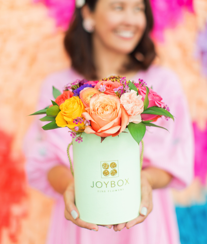 Carrie with JoyBox flower arrangement Carrie Colbert